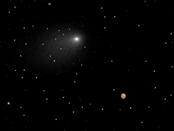 Comet Siding Spring near Mars in a composite image by the Hubble Space Telescope, capturing their positions between Oct. 18 8:06 a.m. EDT (12:06 p.m. UTC) and Oct. 19 11:17 p.m. EDT (Oct. 20, 3:17 a.m. UTC). Credit: NASA, ESA, PSI, JHU/APL, STScI/AURA