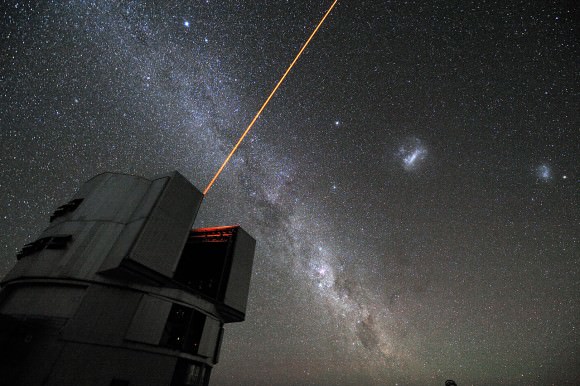 The Very Large Telescoping Interferometer firing it's adaptive optics laser.  Credit: ESO/G. Hüdepohl