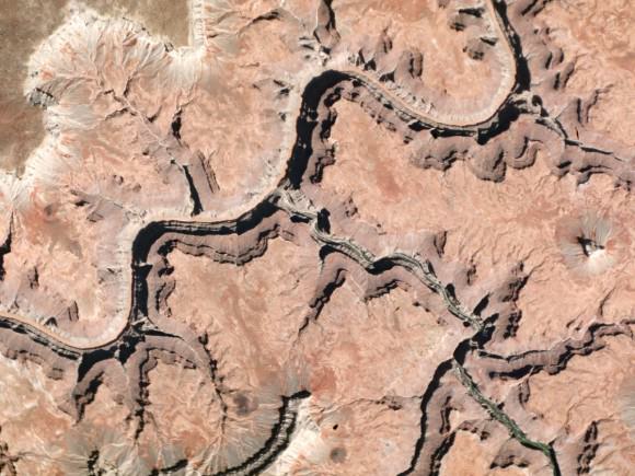 Writes Planet Labs of this image: "The red, sediment-filled Colorado River contrasts with blue-green Havasu Creek in the heart of Grand Canyon National Park. The Colorado River is almost always red in spring and summer, since it collects silt from a huge watershed. Short tributaries, however, usually run clear—only picking up significant sediment during flash floods." Credit: Planet Labs