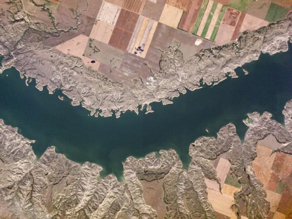 Writes Planet Labs of this image: "Filled in 1967, Lake Diefenbaker is a 140-mile-long reservoir along the South Saskatchewan and Qu’Appelle Rivers. Diefenbaker is renowned for harboring extremely large fish: the world record rainbow trout (48 pounds) and burbot (25 pounds) were both caught in the lake." Credit: Planet Labs