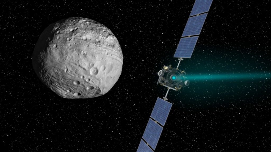 Artist's concept of the Dawn spacecraft arriving at Vesta. Image credit: NASA/JPL-Caltech