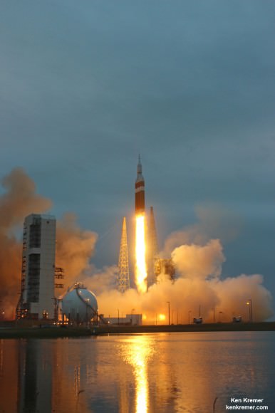 NASA’s first Orion spacecraft blasts off at 7:05 a.m. atop United Launch Alliance Delta 4 Heavy Booster at Space Launch Complex 37 (SLC-37) at Cape Canaveral Air Force Station in Florida on Dec. 5, 2014.   Launch pad remote camera view.   Credit: Ken Kremer - kenkremer.com 