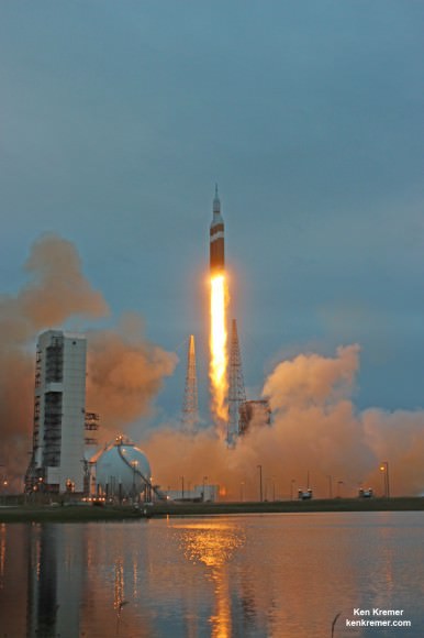 NASA’s first Orion spacecraft blasts off at 7:05 a.m. atop United Launch Alliance Delta 4 Heavy Booster at Space Launch Complex 37 (SLC-37) at Cape Canaveral Air Force Station in Florida on Dec. 5, 2014.   Launch pad remote camera view.   Credit: Ken Kremer - kenkremer.com