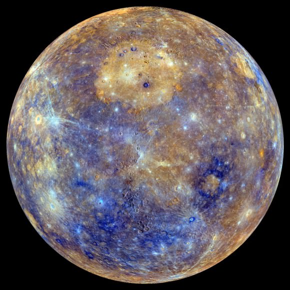 Caloris in Color – An enhanced-color view of Mercury, assembled from images taken at various wavelengths by the cameras on board the MESSENGER spacecraft. The circular, orange area near the center-top of the disc is Caloris Basin. Apollodorus and Pantheon Fossae can be seen at the center-left of the basin. Credit: NASA / Johns Hopkins University Applied Physics Laboratory / Carnegie Institution of Washington