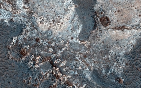 This area south of Coprates Chasma is an example of sulfate and clay deposits on Mars, showing water once flowed readily in this region. Why the water evaporated from the Red Planet is one question scientists are hoping to answer with missions such as the Mars Reconnaissance Orbiter, which took this image (released in December 2014). Credit: NASA/JPL-Caltech/University of Arizona