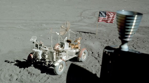 Apollo 17's lunar rover, flag and part of the lunar module in this view taken out the module's window. Credit: NASA