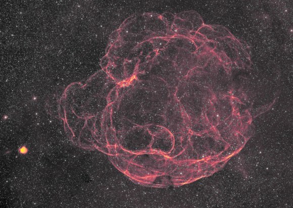 Simeis 147, the "Spaghetti Nebula", shines in hydrogen alpha in this image captured by Rick Stevenson on Flickr.