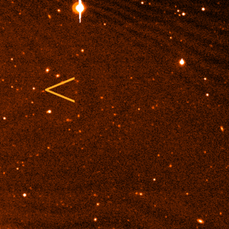 Animation showing the movement of Eris on the images used to discover it. Eris is indicated by the arrow. The three frames were taken over a period of three hours. (Credit: Brown, et al.)