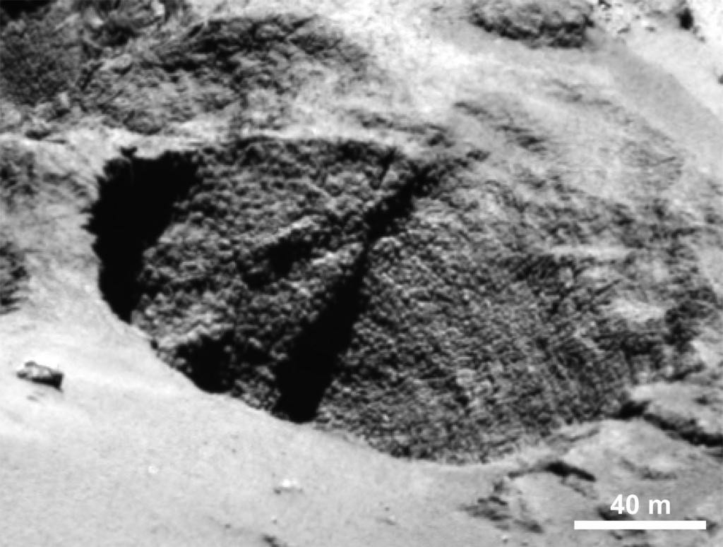 Close-up of a curious surface texture nicknamed ‘goosebumps’. The characteristic scale of all the bumps seen on Comet 67P/Churyumov–Gerasimenko by the OSIRIS narrow-angle camera is approximately 3 m, extending over regions greater than 100 m. They are seen on very steep slopes and on exposed cliff faces, but their formation mechanism is yet to be explained. Credit: ESA/Rosetta/MPS for OSIRIS Team MPS/UPD/LAM/IAA/SSO/INTA/UPM/DASP/IDA