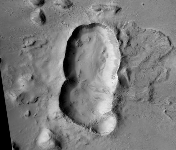 A triple crater in Elysium Planitia on Mars. Credit: NASA/JPL/University of Arizona.