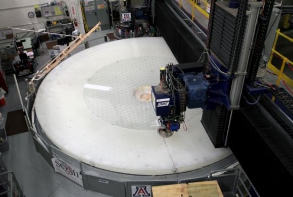 The unique LSST M1/M3 mirror surfaces being carefully polished. Credit: E. Acosta / LSST Corporation.