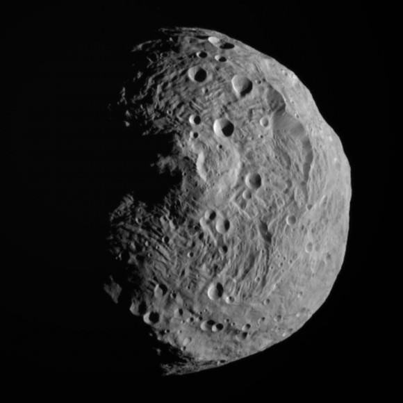 You're looking straight down on the 310-mile-wide Rheasilvea crater / impact basin on the asteroid Vesta. Credit: NASA/JPL-Caltech/UCLA/MPS/DLR/IDA