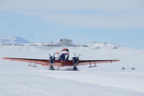 AWI's Polar 6 aircraft takes off from the runway at the Princess Elisabeth Antarctica research station. © International Polar Foundation / Jos Van Hemelrijck