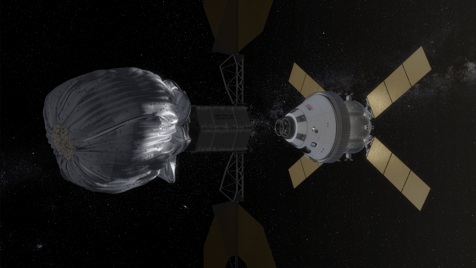An artist's conception of how an unmanned spacecraft might redirect an asteroid into lunar orbit. Credit: NASA