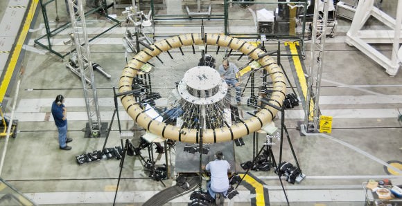 The  Hypersonic Inflatable Aerodynamic Decelerator prototype undergoes structural tests at NASA Armstrong's Flight Loads Laboratory in this undated photo. Tests took place in 2013 and 2014. Credit: NASA