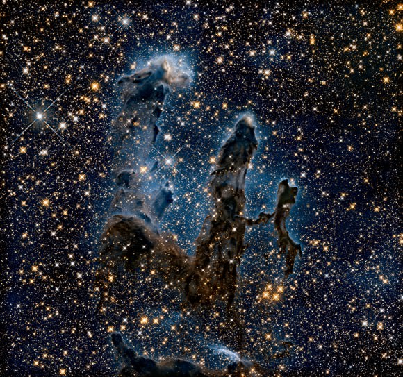 The Eagle Nebula's pillars of creation captured in infrared light with the Hubble Space Telescope, in 2015. Credit: NASA, ESA/Hubble and the Hubble Heritage Team