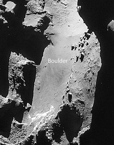 Although the viewing angle and lighting geometry has changed some between this photo, taken Jan. 8, and the one above, it certainly appears that the three cracks have virtually disappeared in a month's time. The same boulder is flagged in both photos. Credit: ESA/Rosetta/Navcam