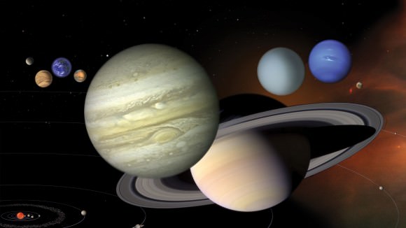 Color illustration showing the scale of planets in our solar system, focusing on Jupiter and Saturn. Credit: NASA