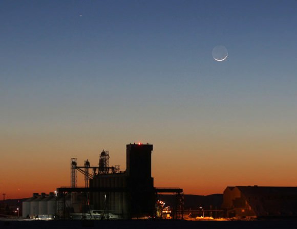 The key to good photos in twilight is balancing the different types of lighting - dusk, the sunlit crescent, the earth-lit portion and the planets. Shoot pictures at a variety of exposures between about 30-60 minutes after sunset when the western sky is still aglow but the Moon is bright and obvious. Credit: Bob King