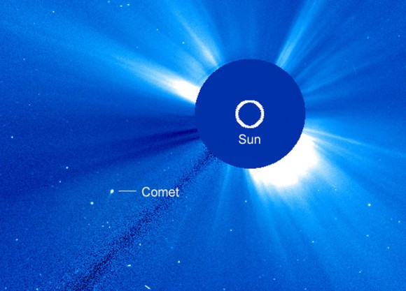 SOHO-2875 seen in a second, wide-field coronograph called LASCO C2 at 2:42 a.m. today Feb. 20. It's already moved a good distance to the west-southwest of the Sun and still displays a short tail. Credit: NASA/ESA
