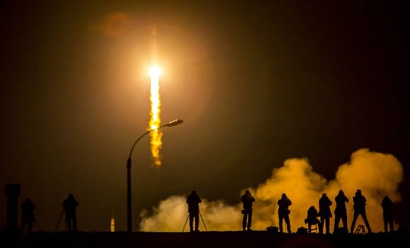Year in Space Begins With Soyuz Launch.  Media photograph the Soyuz TMA-16M spacecraft as it launches to the ISS with Expedition 43 NASA astronaut Scott Kelly, Russian cosmonauts Mikhail Kornienko and Gennady Padalka of the Russian Federal Space Agency (Roscosmos) onboard at 3:42 p.m. EDT Friday, March 27, 2015 (March 28 Kazakh time) from the Baikonur Cosmodrome in Kazakhstan. Credit: NASA/Bill Ingalls