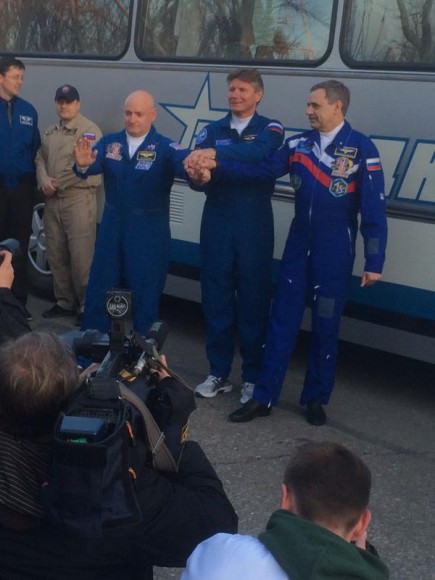 NASA's Scott @StationCDRKelly with his #Exp43 crew heading for suit up and launch. Credit: NASA