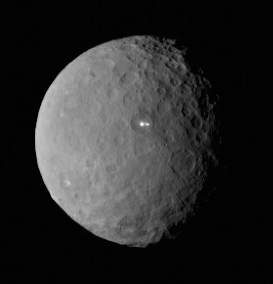This image was taken by NASA's Dawn spacecraft of dwarf planet Ceres on Feb. 19 from a distance of nearly 29,000 miles (46,000 kilometers). It shows that the brightest spot on Ceres has a dimmer companion, which apparently lies in the same basin. Image Credit:  NASA/JPL-Caltech/UCLA/MPS/DLR/IDA