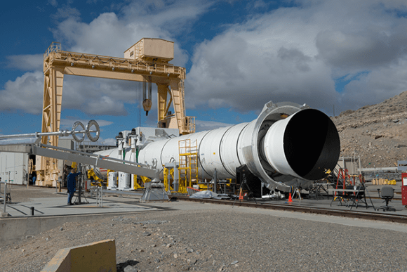 Orbital ATK’s five segment rocket motor is assembled in its Promontory, Utah, test stand where it is being conditioned for the March 11 ground test.  Credit: Orbital ATK  