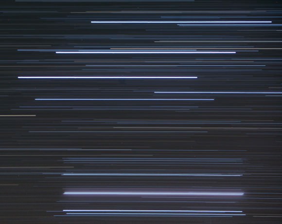 Orion's Belt and Sword trail in this time exposure made with a 200mm lens. The nearly perfectly parallel because the stars lie very near the celestial equator and were on the meridian at the time. 