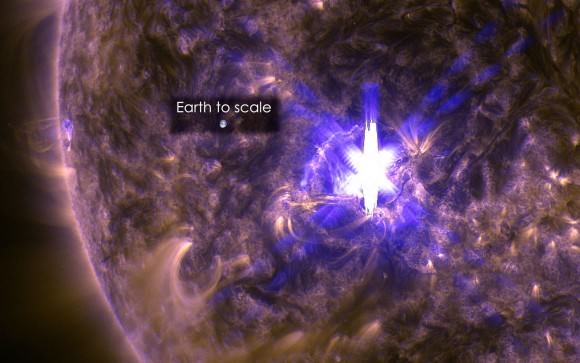 A powerful X2.2-class flare from sunspot region 2297 glows fiery yellow in this photo taken by NASA’s Solar Dynamics Observatory on March 11, 2015. Credit: NASA