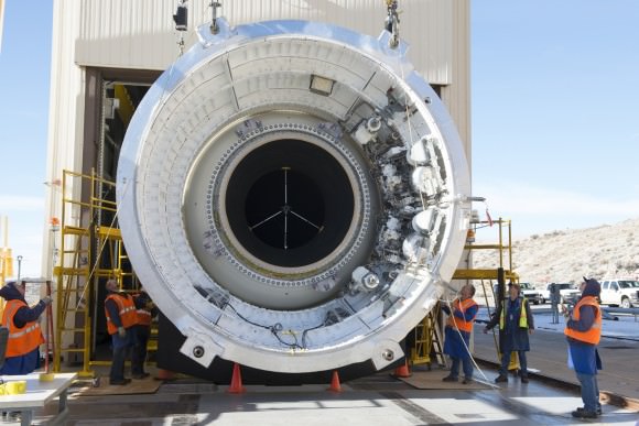 Engineers at Orbital ATK in Promontory, Utah, prepare to test the booster that will help power NASA’s Space Launch System to space to begin missions to deep space, including to an asteroid and Mars. A test on March 11 is one of two that will qualify the booster for flight.  Image Credit:  Orbital ATK