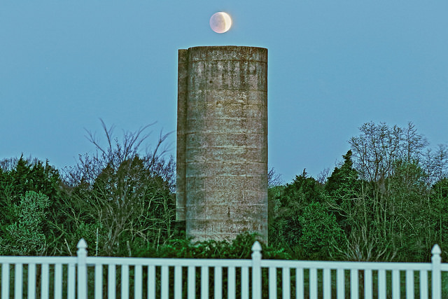 A partial phase for the April 4th lunar eclipse above a silo. Image credit and copyright: Brian who is called Brian