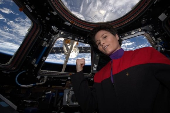"There's coffee in that nebula"... ehm, I mean... in that #Dragon.  Engineer Samantha Cristoforetti of the European Space Agency in Star Trek uniform as Dragon arrives at the International Space Station on April 17, 2015. Credit: NASA