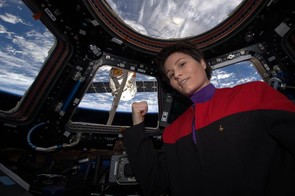 Flight Engineer Samantha Cristoforetti of the European Space Agency in Star Trek uniform as SpaceX Dragon arrives at the International Space Station on April 17, 2015. Credit: NASA 