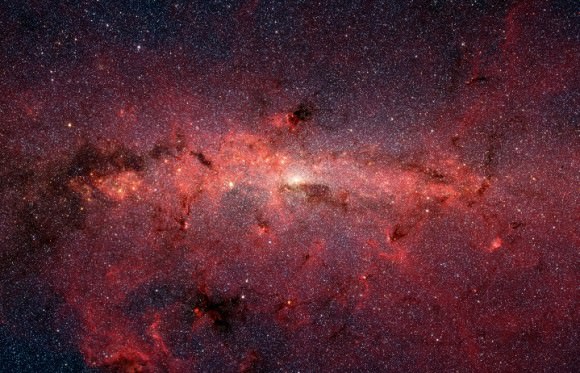 This dazzling infrared image from NASA's Spitzer Space Telescope shows hundreds of thousands of stars crowded into the swirling core of our spiral Milky Way galaxy. Credit: NASA/JPL-Caltech