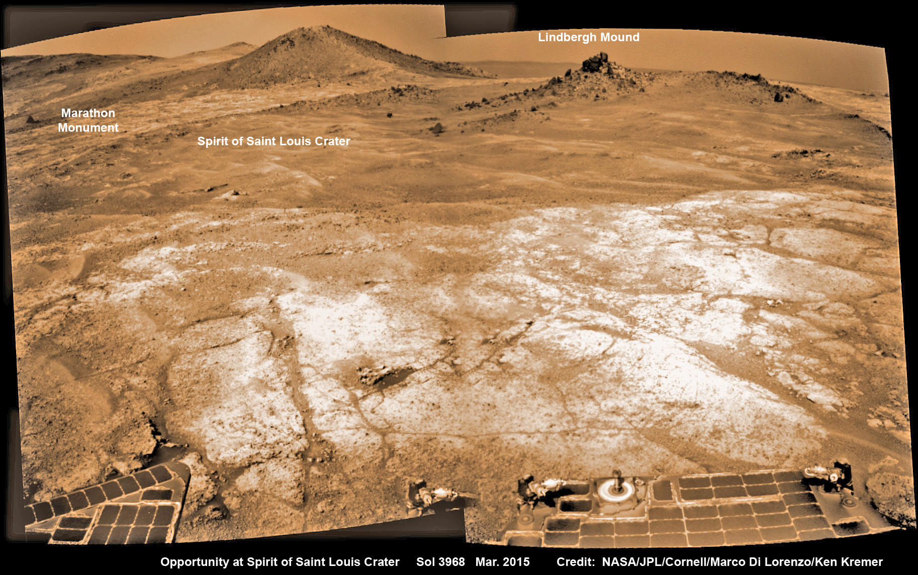 Opportunity’s view (annotated) on the day the NASA rover exceeded the distance of a marathon on the surface of Mars on March 24, 2015, Sol 3968 with features named in honor of Charles Lindbergh’s historic solo flight across the Atlantic Ocean in 1927. Rover stands at Spirit of Saint Louis Crater near mountaintop at Marathon Valley overlook and Martian cliffs at Endeavour crater holding deposits of water altered clay minerals.  This navcam camera photo mosaic was assembled from images taken on Sol 3968 (March 24, 2015) and colorized.  Credit: NASA/JPL/Cornell/Marco Di Lorenzo/Ken Kremer/kenkremer.com