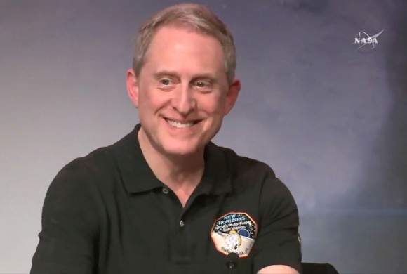 Mission principal investigator has reason to smile this morning during the press conference. So far, New Horizons is doing well. Credit: NASA-TV