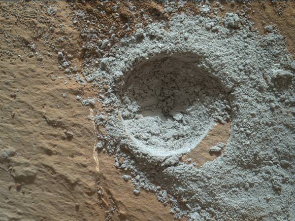 Red Mars, Gray Mars: "Mini-start hole" drill maneuver was successful.  Image of mini start drill hole taken by Mars Hand Lens Imager (MAHLI) aboard NASA's Mars rover Curiosity on July 30, 2015, Sol 1059. Credit: NASA/JPL-Caltech/MSSS