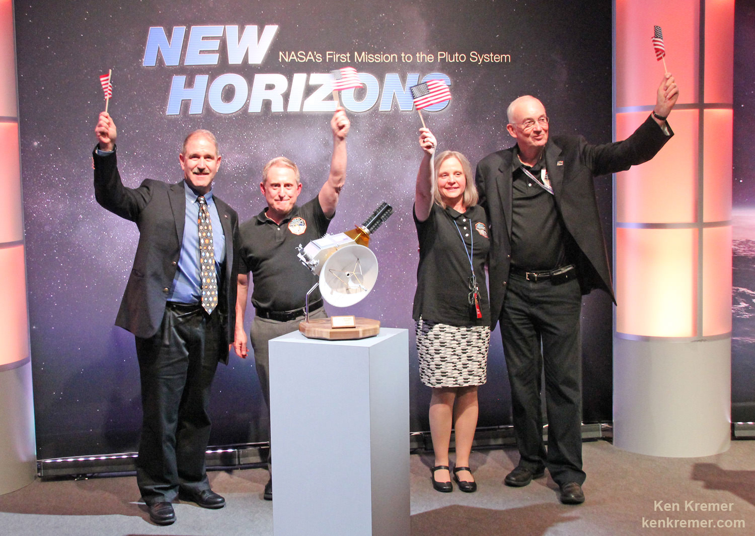 NASA Associate Administrator for the Science Mission Directorate John Grunsfeld, left, New Horizons Principal Investigator Alan Stern of Southwest Research Institute (SwRI), Boulder, CO, second from left, New Horizons Mission Operations Manager Alice Bowman of the Johns Hopkins University Applied Physics Laboratory (APL), second from right, and New Horizons Project Manager Glen Fountain of APL, right, are seen at the conclusion of a press conference after the team received confirmation from the spacecraft that it has completed the flyby of Pluto, Tuesday, July 14, 2015 at the Johns Hopkins University Applied Physics Laboratory (APL) in Laurel, Maryland. Credit:  Ken Kremer/kenkremer.com