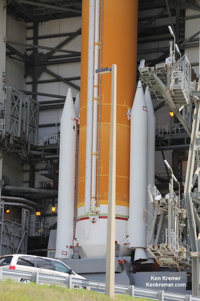 Up close look at base of first stage of United Launch Alliance Delta IV rocket and four solid rocket motors lofting US Air Force WGS 7 military communications satellite into orbit. Launch reset for Thursday, July 23, at 8:07 p.m. EDT.  Credit: Ken Kremer/kenkremer.com  