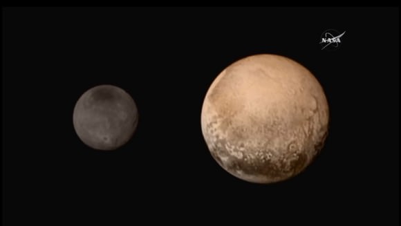 Artist's impression of Charon (left) and Pluto (right), showing their relative sizes. Credit: