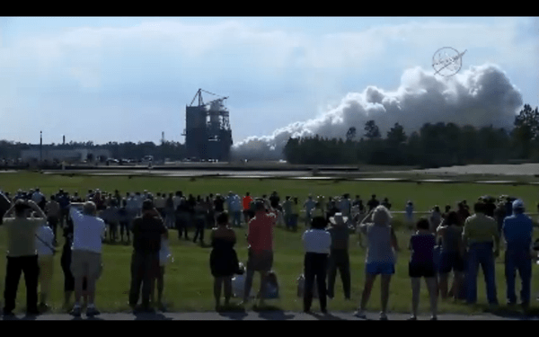 Spectators enjoy the view during the Aug. 13, 2015 test firing of the RS-25 engine for NASA’s Space Launch System (SLS) on the A-1 test stand at NASA's Stennis Space Center near Bay St. Louis, Mississippi.  Credit: NASA