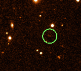 Distant Sedna (circled) moving against the starry background). Image credit: NASA/Hubble