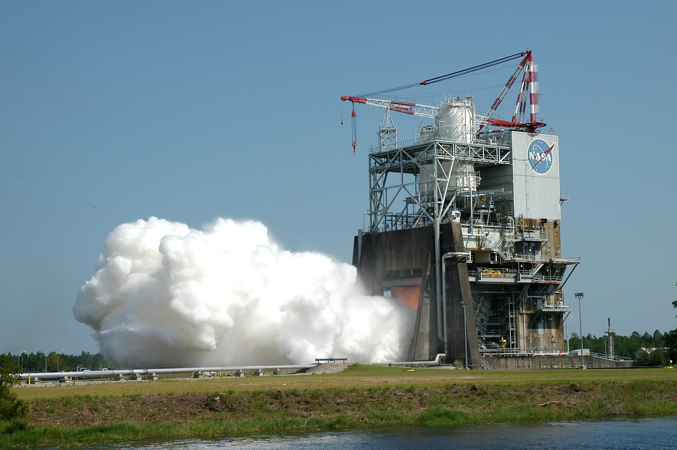 During a 535-second test on August 13, 2015, operators ran the Space Launch System (SLS) RS-25 rocket engine through a series of tests at different power levels to collect engine performance data on the A-1 test stand at NASA's Stennis Space Center near Bay St. Louis, Mississippi.  Credit: NASA   