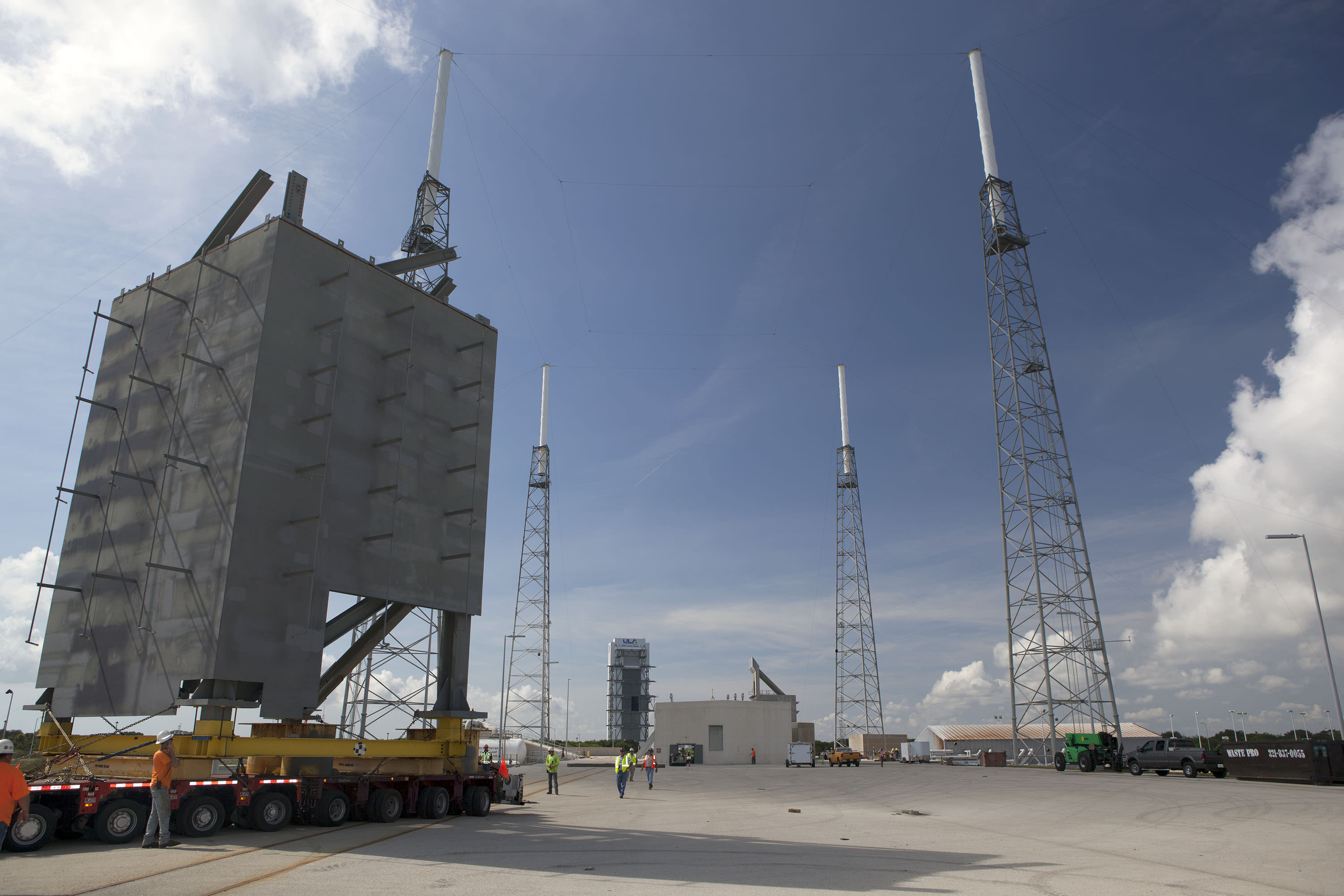 The first tier of the new Crew Access Tower for the Boeing CST-100 Starliner arrives at Space Launch Complex-41 at Cape Canaveral Air Force Station in Florida.   The tower will provide access at the pad for astronauts and ground support teams  to the Boeing CST-100 Starliner launching atop a United Launch Alliance Atlas V rocket.   Photo credit: NASA/Dmitrios Gerondidakis