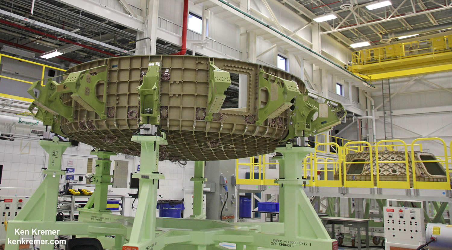 First view of the Boeing CST-100 'Starliner' crewed space taxi at the Sept. 4, 2015 Grand Opening ceremony held in the totally refurbished C3PF manufacturing facility at NASA's Kennedy Space Center. These are the upper and lower segments of the first Starliner crew module known as the Structural Test Article (STA) being built at Boeing’s Commercial Crew and Cargo Processing Facility (C3PF) at KSC. Credit: Ken Kremer /kenkremer.com