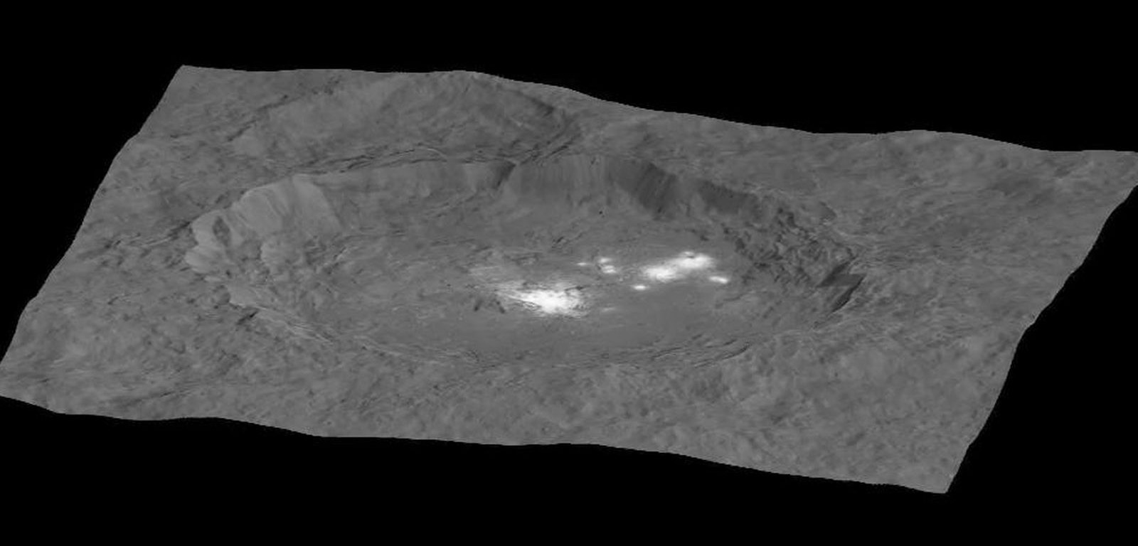 Circling the Lights of Occator crater on Ceres.  This image, made using images taken by NASA's Dawn spacecraft during the mission's High Altitude Mapping Orbit (HAMO) phase  and draped over a shape model, shows Occator crater on Ceres, home to a collection of intriguing bright spots.  The image  has been stretched by 1.5 times in the vertical direction to better illustrate the crater's topography.  Credits: NASA/JPL-Caltech/UCLA/MPS/DLR/IDA