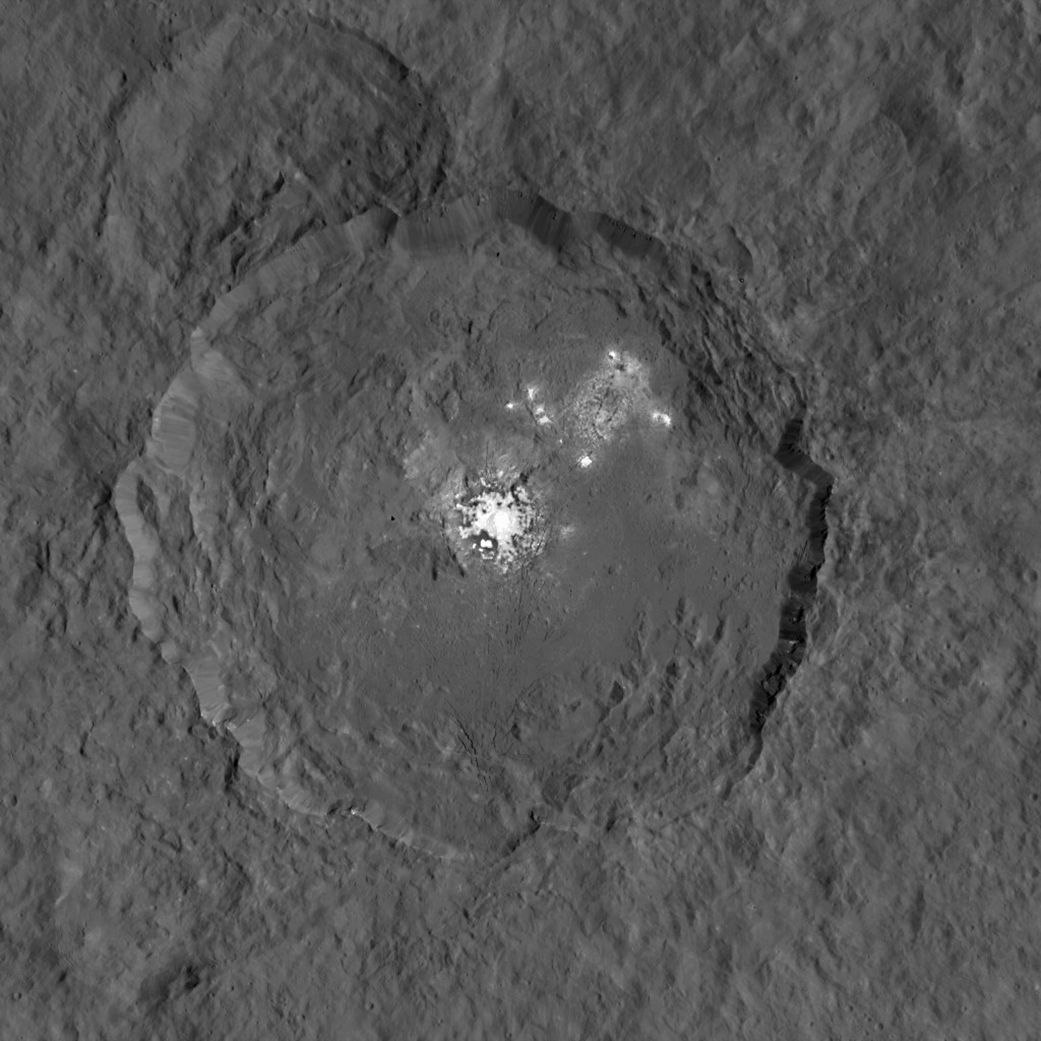 This image, made using images taken by NASA's Dawn spacecraft during the mission's High Altitude Mapping Orbit (HAMO) phase, shows Occator crater on Ceres, home to a collection of intriguing bright spots.  Credits: NASA/JPL-Caltech/UCLA/MPS/DLR/IDA