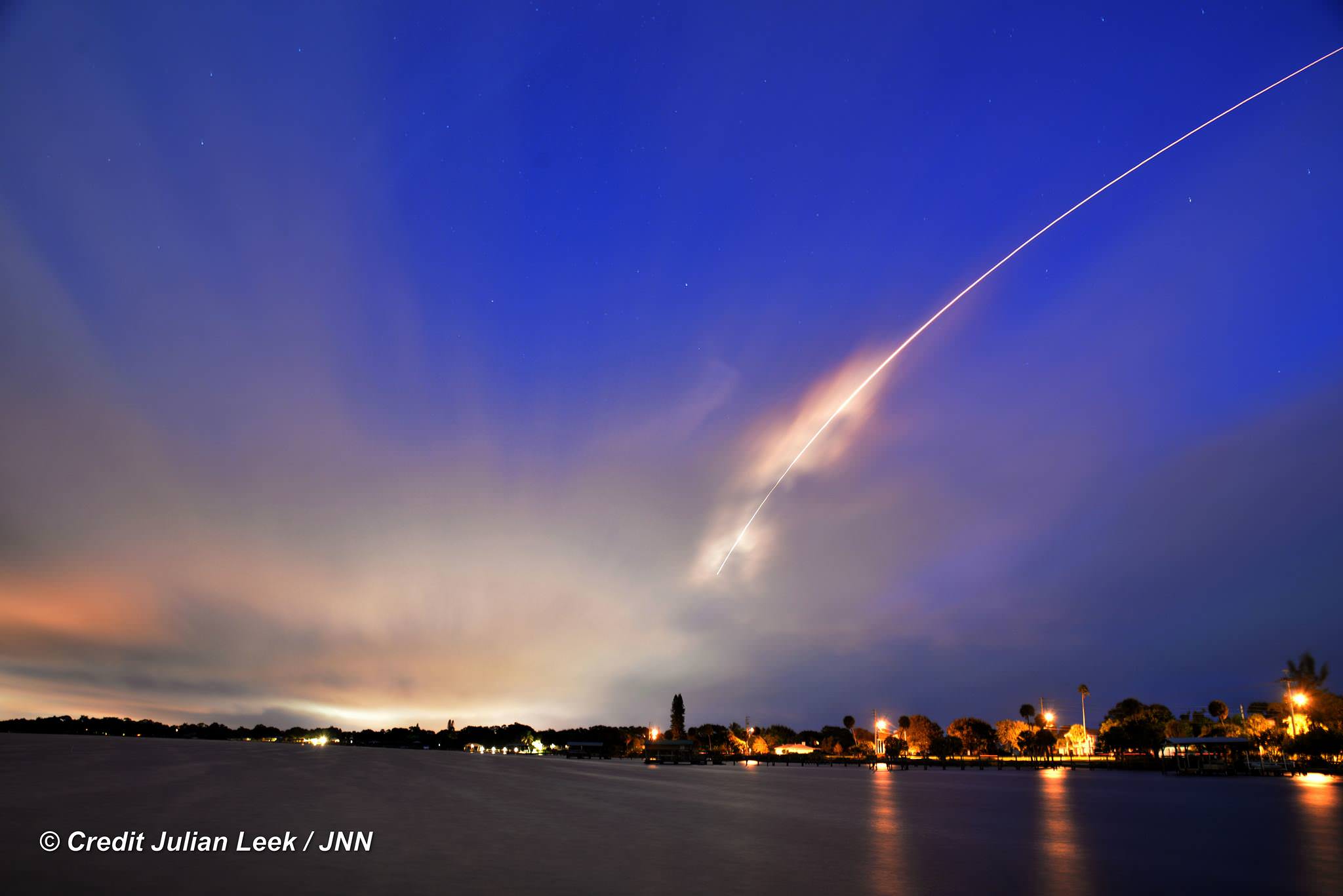 100th United Launch Alliance (ULA) rocket streaks to orbit with Atlas V booster carrying the Morelos-3 mission for Mexico from Space Launch Complex 41 on Cape Canaveral Air Force Station, Florida at 6:28 a.m. EDT, Oct. 2, 2015 as seen from Melbourne Beach pier, Florida.  Credit: Julian Leek