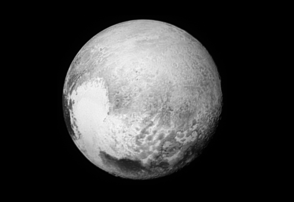 A new map of Pluto's 'heart.' This image released on October 29, 2015, provides fascinating new details to help the science team map the informally named Krun Macula (the prominent dark spot at the bottom of the image) and the complex terrain east and northeast of Pluto's "heart" (Tombaugh Regio). Pluto's north pole is on the planet's disk at the 12 o'clock position of this image. Credit: NASA/Johns Hopkins University Applied Physics Laboratory/Southwest Research Institute
